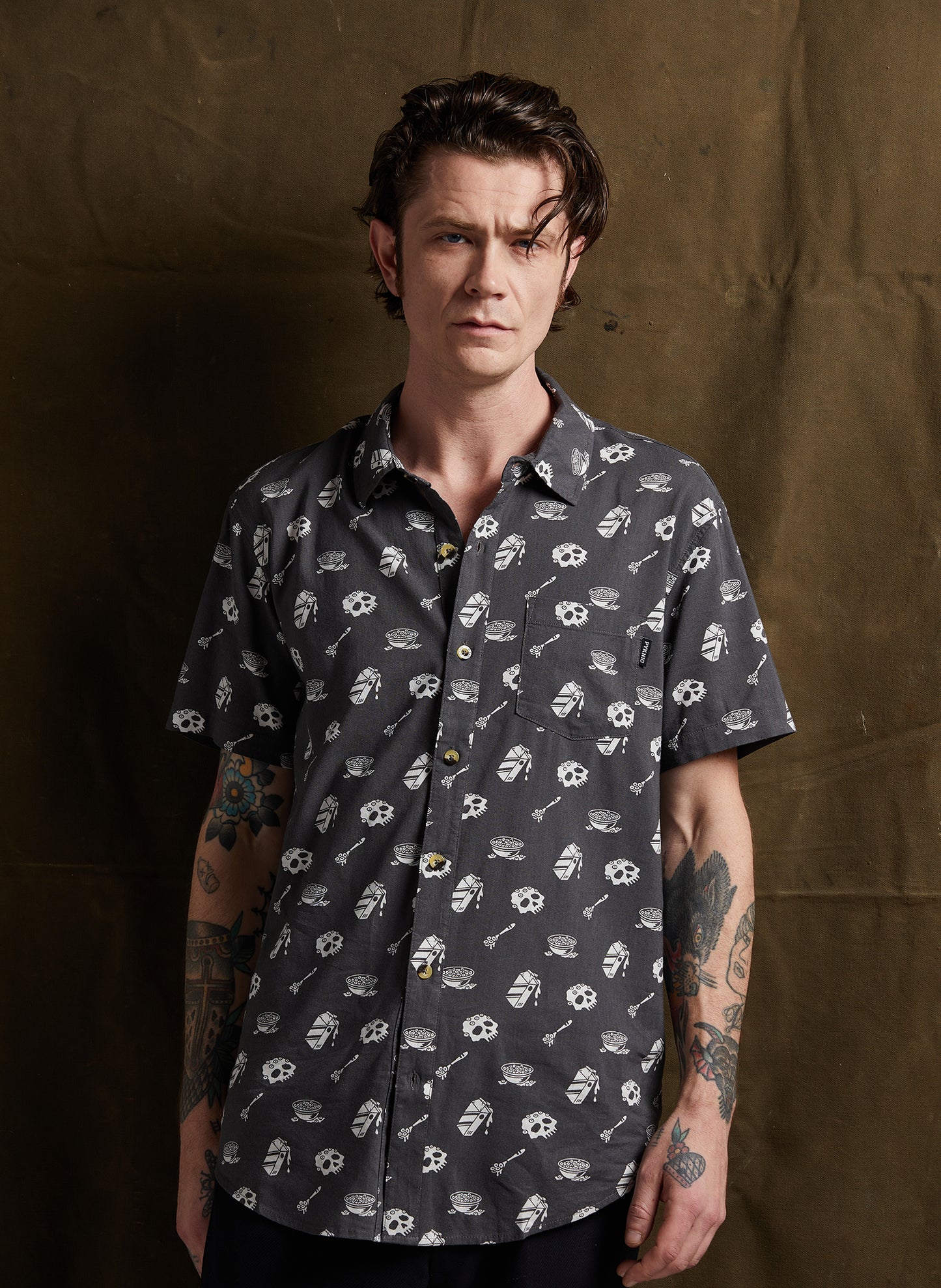 men - Pyknic | Cereal Killer Vacation Casual Button-Up Shirt | Button Down Shirt with All Over Graphic Print, Cereal Bowl and Milk Shirt, Cool Food Shirt, Best Foodie Shirt, Best Foodie Gift, Food Themed Apparel, Food Tattoo Flash, Skull Pattern Button Down Shirt, Cool Button Up Shirts, Alternative Lifestyle Brand, Motorcycle Lifestyle Brand, Breakfast Shirt