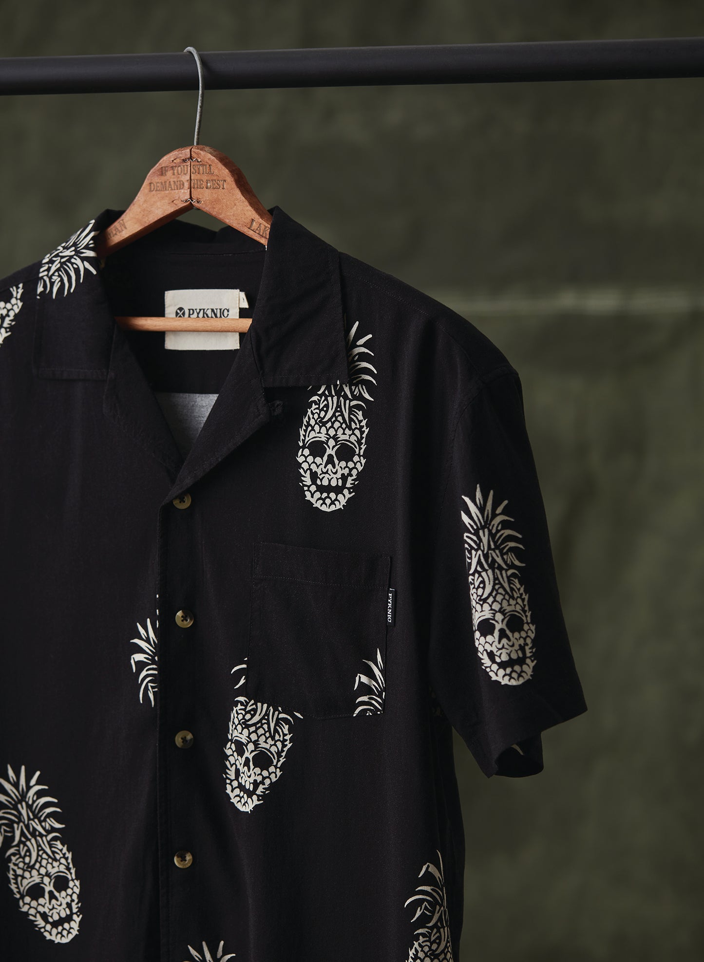Pyknic | Permanent Vacation Casual Button-Up Shirt | Button Down Shirt with All Over Graphic Print, Tropical Pineapple Skull Tiki Shirt, Cool Food Shirt, Best Foodie Shirt, Best Foodie Gift, Food Themed Apparel, Food Tattoo Flash, Pineapple Pattern Button Down Shirt, Cool Button Up Shirts, Alternative Lifestyle Brand, Motorcycle Lifestyle Brand, Skull Button Up Shirt, 