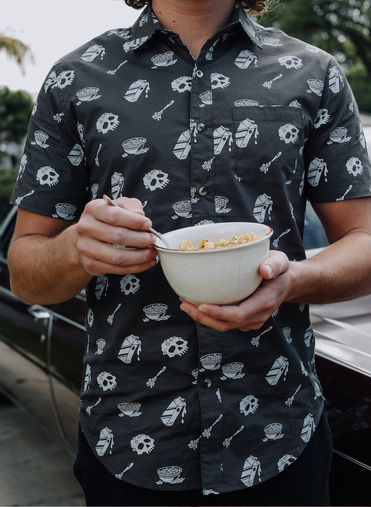 Pyknic | Cereal Killer Vacation Casual Button-Up Shirt | Button Down Shirt with All Over Graphic Print, Cereal Bowl and Milk Shirt, Cool Food Shirt, Best Foodie Shirt, Best Foodie Gift, Food Themed Apparel, Food Tattoo Flash, Skull Pattern Button Down Shirt, Cool Button Up Shirts, Alternative Lifestyle Brand, Motorcycle Lifestyle Brand, Breakfast Shirt